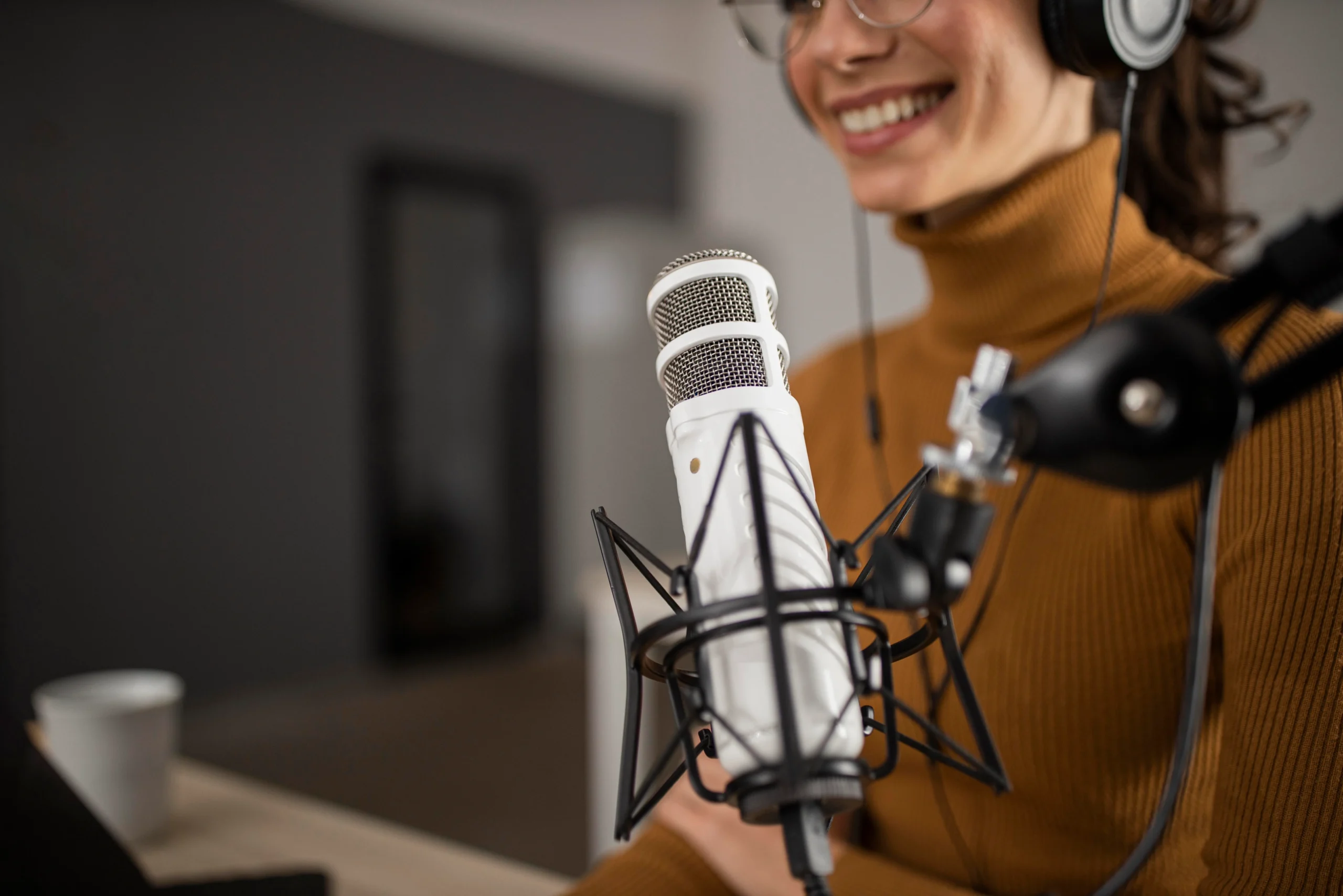 woman-broadcasting-radio-while-smiling